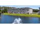 Exterior of a condo with a pond view and lots of green space at 4503 W Harbour Ct. # S9, Little River, SC 29566