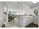 Bright open-concept living room and kitchen with neutral tones, plenty of space and natural light at 4503 W Harbour Ct. # S9, Little River, SC 29566