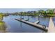 Scenic waterway with boat docks and stunning waterfront homes, showcasing community charm at 4503 W Harbour Ct. # S9, Little River, SC 29566