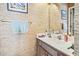 Half bathroom featuring textured wallpaper, a single vanity, and a towel rack at 4616 Greenbriar Dr. # H-4, Little River, SC 29566
