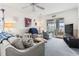 Cozy living room with nautical accents, comfortable seating, and a glimpse of the serene waterfront scenery at 4616 Greenbriar Dr. # H-4, Little River, SC 29566