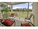 Relaxing covered balcony with comfortable seating overlooking the beautiful golf course at 4878 Luster Leaf Circle # 402, Myrtle Beach, SC 29577