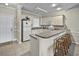 A view of a modern kitchen, featuring lots of storage space, counter space, and bar seating area at 4878 Luster Leaf Circle # 402, Myrtle Beach, SC 29577