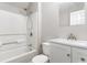 Bright bathroom featuring a shower-tub combo, white vanity, and a coordinating mirror at 505 Forestbrook Dr., Myrtle Beach, SC 29579