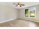 Bedroom featuring wood-look flooring, neutral paint, and windows for natural light at 505 Forestbrook Dr., Myrtle Beach, SC 29579