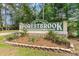 Entrance sign to the Forestbrook restricted residential community with manicured landscaping at 505 Forestbrook Dr., Myrtle Beach, SC 29579