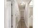 Hallway featuring wood-look flooring, neutral paint, and access to multiple rooms at 505 Forestbrook Dr., Myrtle Beach, SC 29579