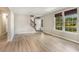 Bright living room featuring hardwood floors and large windows at 505 Forestbrook Dr., Myrtle Beach, SC 29579