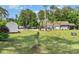 Community pool area featuring a pool, playground, and building at 505 Forestbrook Dr., Myrtle Beach, SC 29579
