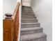 Carpeted stairway with wood railing at 505 Forestbrook Dr., Myrtle Beach, SC 29579