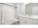 Modern bathroom featuring a shower-tub combo, white vanity with sink, and coordinated fixtures at 512 Haven View Way, Murrells Inlet, SC 29576