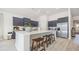 Modern kitchen with quartz countertops, stainless appliances, and a large center island with seating at 512 Haven View Way, Murrells Inlet, SC 29576