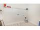 Laundry room with washer/dryer hookups, wire shelving, and light vinyl flooring at 512 Haven View Way, Murrells Inlet, SC 29576