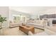 Bright living room seamlessly connects to an open-concept kitchen, enhancing the space's versatility at 512 Haven View Way, Murrells Inlet, SC 29576