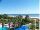 Breathtaking beach view from balcony with palm trees and oceanfront scenery for serene coastal living at 5300 N Ocean Blvd. # 310, Myrtle Beach, SC 29577