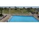 Aerial view of an outdoor pool near the beach and wooden walking bridge at 5300 N Ocean Blvd. # 310, Myrtle Beach, SC 29577
