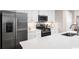 Modern kitchen featuring sleek appliances, ample counter space, and stylish cabinetry at 532 Ryegrass Way # 0029B, Murrells Inlet, SC 29576