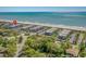 Coastal condominium complex near the beach with mature trees and lush landscaping at 5601 N Ocean Blvd. # E-304, Myrtle Beach, SC 29577