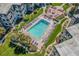 Breathtaking aerial shot showcasing a sparkling pool and lush landscaping at 5601 N Ocean Blvd. # E-304, Myrtle Beach, SC 29577