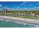 Coastal condominium complex on a white sand beach with Atlantic ocean views at 5601 N Ocean Blvd. # E-304, Myrtle Beach, SC 29577