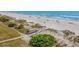Expansive aerial view of a pristine beach with clear blue waters at 5601 N Ocean Blvd. # E-304, Myrtle Beach, SC 29577
