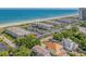 Coastal condominium complex near the beach with mature trees and lush landscaping at 5601 N Ocean Blvd. # E-304, Myrtle Beach, SC 29577