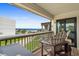 Balcony seating offers peaceful views of the ocean and lawn at 5601 N Ocean Blvd. # E-304, Myrtle Beach, SC 29577