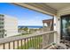 Comfortable balcony overlooks a pool and offers a breathtaking view of the ocean at 5601 N Ocean Blvd. # E-304, Myrtle Beach, SC 29577