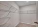 Walk-in closet with multiple shelves for optimal organization at 572 Woodland Farms Circle, Aynor, SC 29511