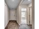 Inviting entryway with wood-look flooring and neutral paint at 572 Woodland Farms Circle, Aynor, SC 29511