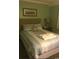 Relaxing bedroom with comfy bed, side tables, and beach-themed décor at 5905 S Kings Hwy. # 314-B, Myrtle Beach, SC 29575