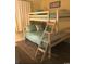A bedroom equipped with a sturdy bunk bed, designed for summer vibes and cozy summer days at 5905 S Kings Hwy. # 314-B, Myrtle Beach, SC 29575
