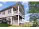Charming multi-level home with a spacious deck and serene backyard views at 6001-1872 S Kings Hwy., Myrtle Beach, SC 29575