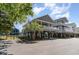 Charming elevated beach house with a spacious porch, offering stunning views and coastal living at its finest at 6001-1872 S Kings Hwy., Myrtle Beach, SC 29575