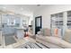 Open-concept living space with a view of the kitchen, featuring stylish furnishings and modern decor at 6001-1872 S Kings Hwy., Myrtle Beach, SC 29575