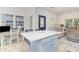 Inviting living space adjoining the kitchen, featuring a well-lit desk area and stylish furnishings at 6001-1872 S Kings Hwy., Myrtle Beach, SC 29575