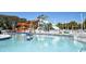 Exterior shot of a waterpark featuring a large swimming pool and colorful water slides at 6001-1872 S Kings Hwy., Myrtle Beach, SC 29575