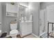 Well-maintained bathroom with white cabinetry, updated fixtures, and walk-in shower at 601 Hillside Dr. N # 1405, North Myrtle Beach, SC 29582