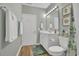 Bright bathroom with a shower/tub combo, single sink vanity and stylish decor at 601 Hillside Dr. N # 1405, North Myrtle Beach, SC 29582