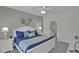 Bright and airy bedroom featuring a comfortable bed and ensuite bathroom at 601 Hillside Dr. N # 1405, North Myrtle Beach, SC 29582