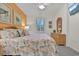 Bright bedroom with nautical decor and wicker furniture provides a cozy, beachy atmosphere at 601 Hillside Dr. N # 1405, North Myrtle Beach, SC 29582