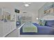 Bright bedroom with a bed, ceiling fan, balcony and coastal decor at 601 Hillside Dr. N # 1405, North Myrtle Beach, SC 29582