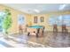 Bright and airy game room featuring a billiard table and comfortable seating at 601 Hillside Dr. N # 1405, North Myrtle Beach, SC 29582