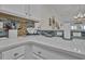 Bright kitchen featuring modern quartz countertops and a stylish backsplash at 601 Hillside Dr. N # 1405, North Myrtle Beach, SC 29582
