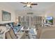 Comfortable living room with large windows and stylish coastal decor at 601 Hillside Dr. N # 1405, North Myrtle Beach, SC 29582