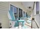 Relax on this peaceful porch with comfortable seating and enjoy the quiet outdoor ambiance at 601 Hillside Dr. N # 1405, North Myrtle Beach, SC 29582