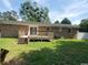 Spacious backyard with a wooden deck, offering a private outdoor space for relaxation and entertainment at 615 Burcale Road Circle, Myrtle Beach, SC 29579