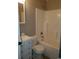 Standard bathroom featuring a tub-shower combo, toilet, and vanity with cabinet storage at 615 Burcale Road Circle, Myrtle Beach, SC 29579