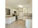 Modern kitchen with granite countertops, stainless steel appliances, and ample cabinet space at 615 Burcale Road Circle, Myrtle Beach, SC 29579