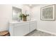 Bright bathroom with double vanity sinks, ample counter space, and modern fixtures at 619 Culmen Ct., Myrtle Beach, SC 29588